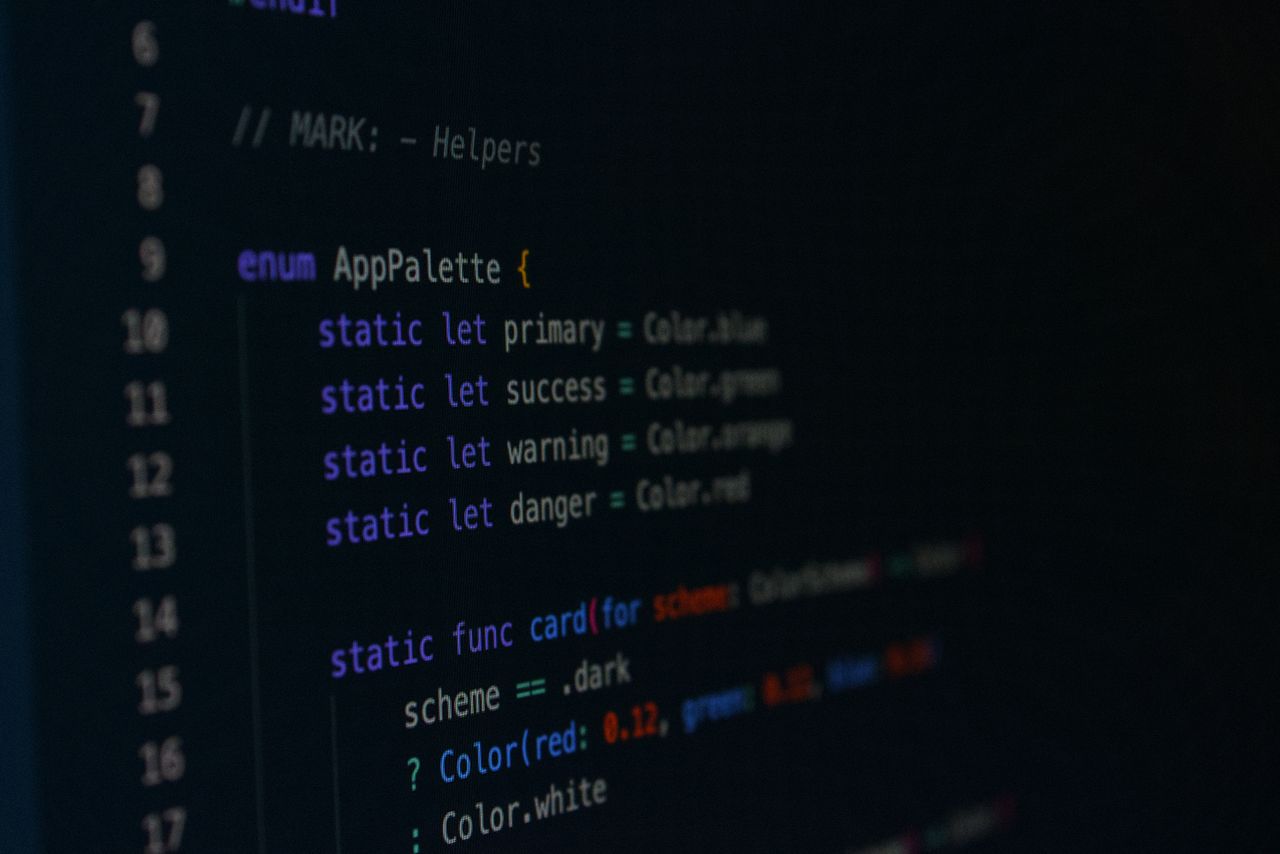 Macro photography of color palette code in a programming environment.